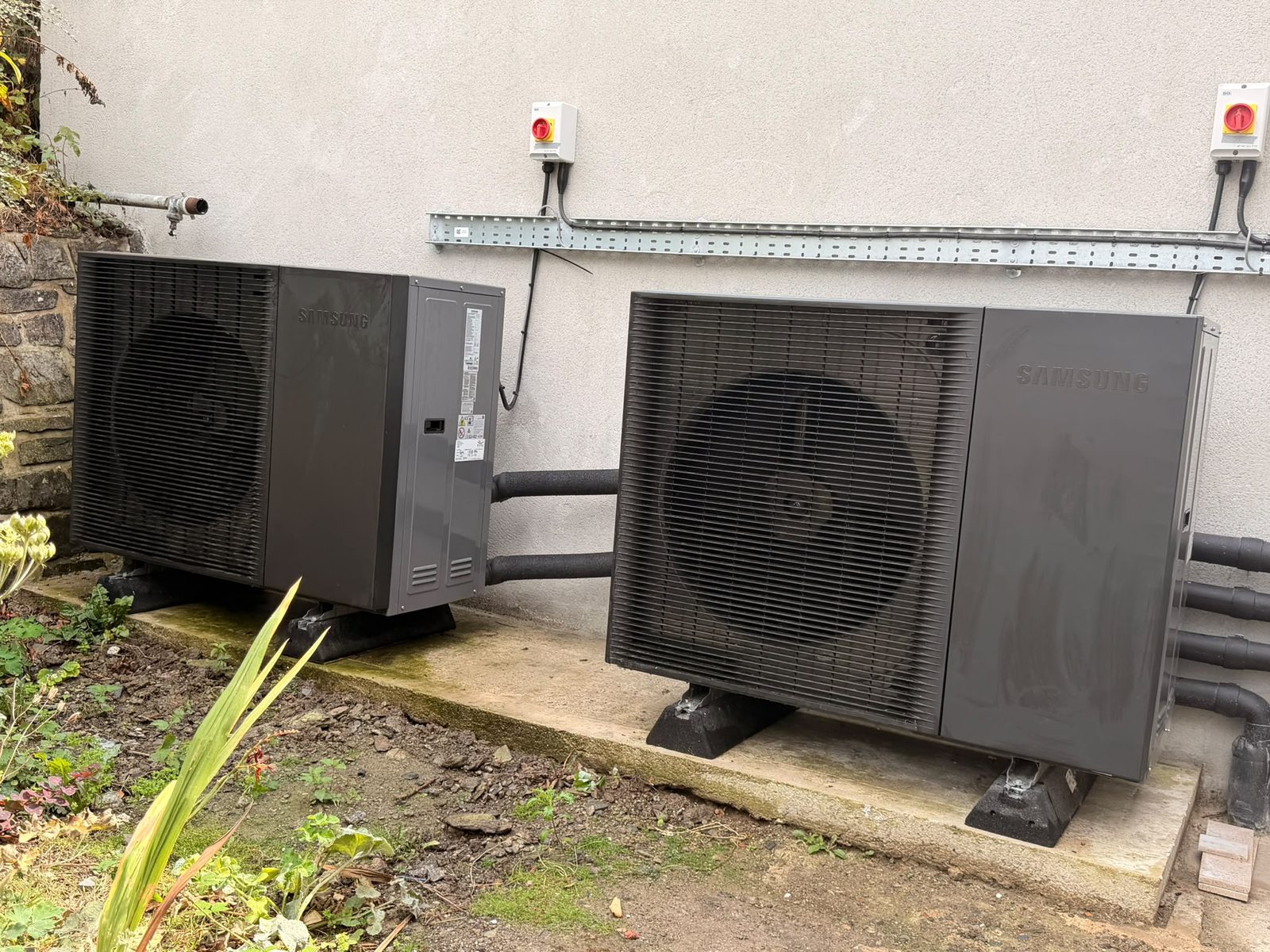Twin Samsung air source heat pump units installed by Allied Heating